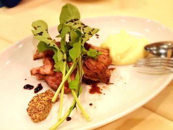 Close-up of served food in plate