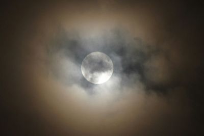 Low angle view of moon against sky