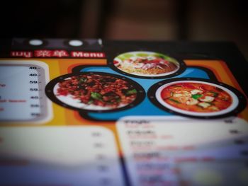 Close-up of pizza served on table