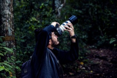 Man photographing with camera