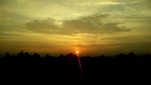 Scenic view of silhouette landscape against sky during sunset