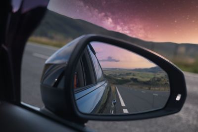 Wing mirror reflection, stair night sky