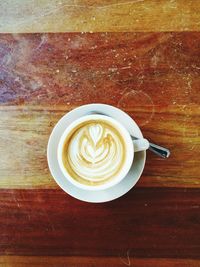 High angle view of cappuccino on table