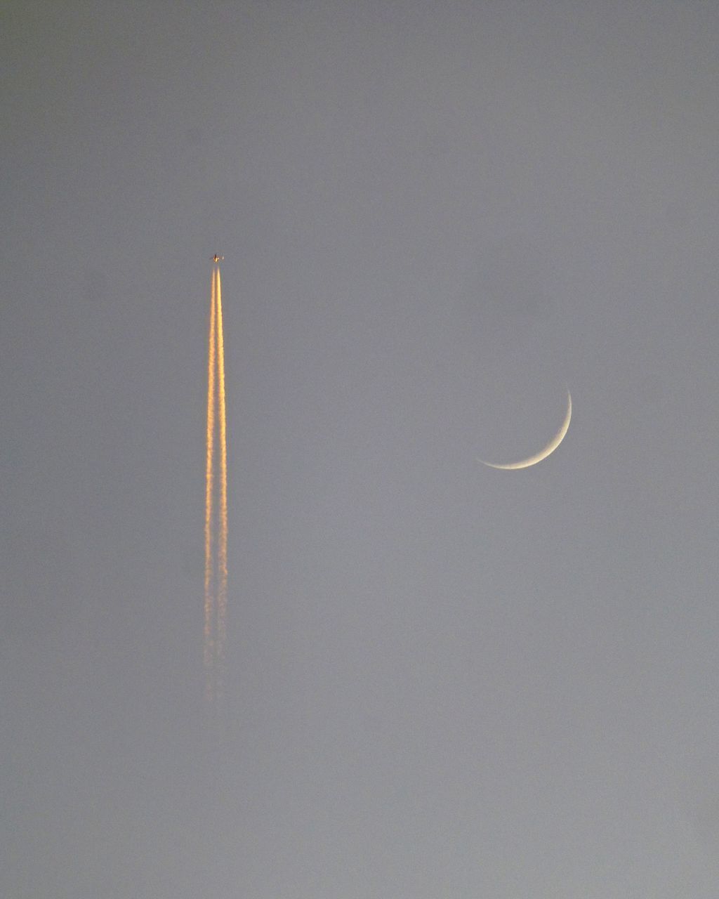 LOW ANGLE VIEW OF VAPOR TRAIL IN SKY