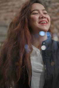 Portrait of a smiling young woman