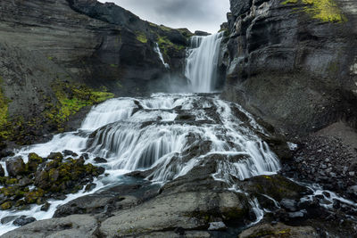 Scenic view of waterfall in forest