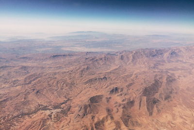 Aerial view of mountains against sky