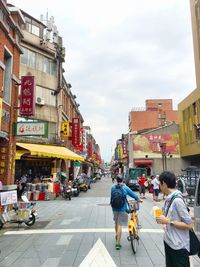 People walking on city street