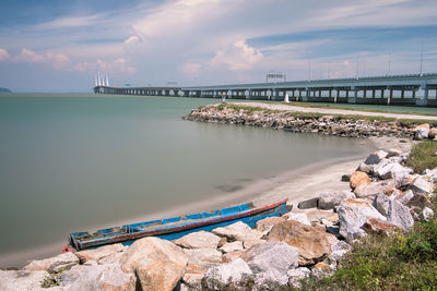 Bridge over river against sky