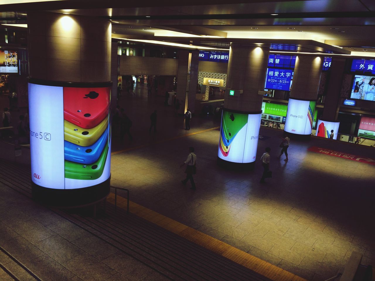 indoors, illuminated, transportation, public transportation, mode of transport, railroad station, train - vehicle, travel, rail transportation, night, men, railroad station platform, incidental people, person, passenger train, subway station, land vehicle, passenger, subway train