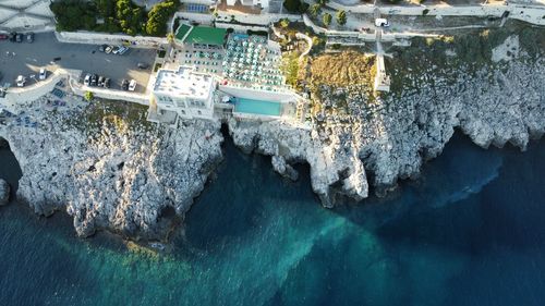 High angle view of townscape by sea