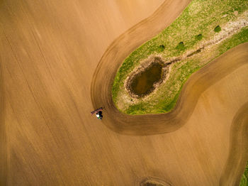 Aerial view of tractor on agricultural field