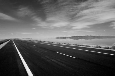 Country road leading towards mountains