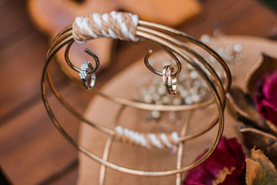 High angle view of wedding rings on table