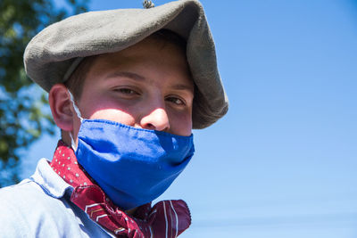 Portrait of south american boy wearing face mask