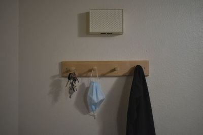 Clothes hanging on wall at home