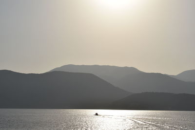 Scenic view of mountains against sky during sunset