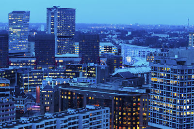 Illuminated buildings in city at night