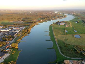 High angle view of river amidst buildings in city