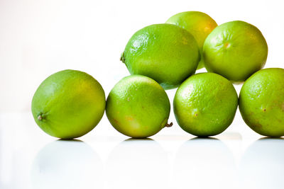 Close-up of fruits against white background