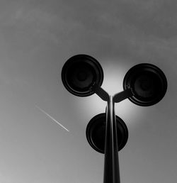 Low angle view of street light against sky