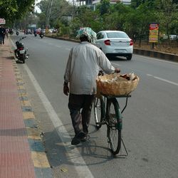 Man with umbrella on street