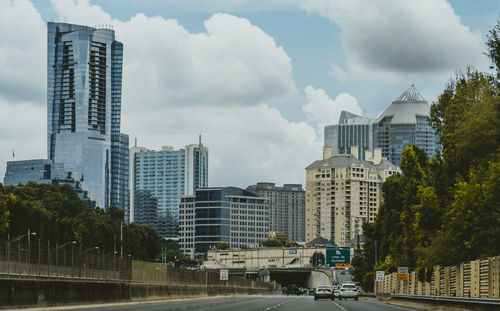 Buildings in city against sky