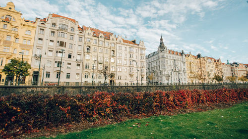 View of buildings against cloudy sky