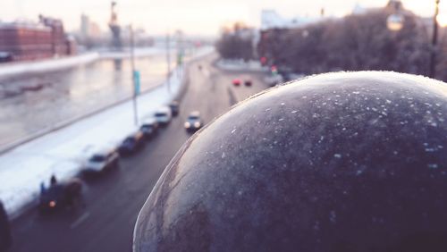 Close-up of car on road