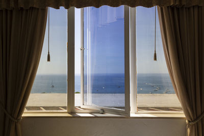 Sea seen through glass window