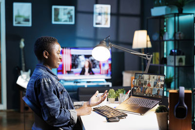 Man using laptop at office