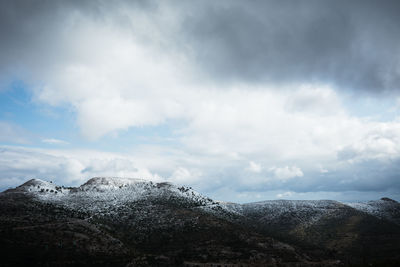 Scenic view of snowcapped mountain against sky