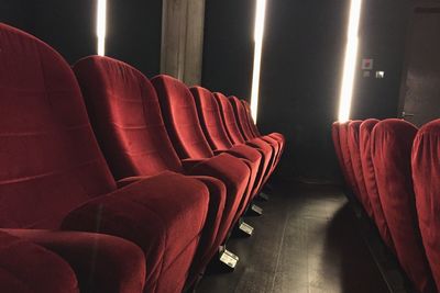 Chairs in illuminated room