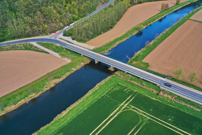 Driving on a street over a channel on a sunny day in germany