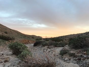 Scenic view of mountains against sky during sunset