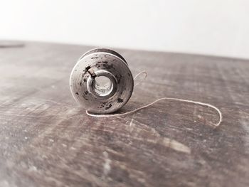 Close-up of metal object on table