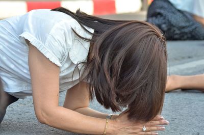 Rear view of women sitting outdoors