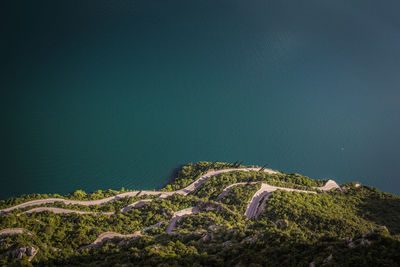 Aerial view of mountain by sea