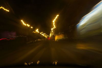 Illuminated street light at night