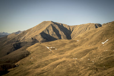 Scenic view of mountains against clear sky