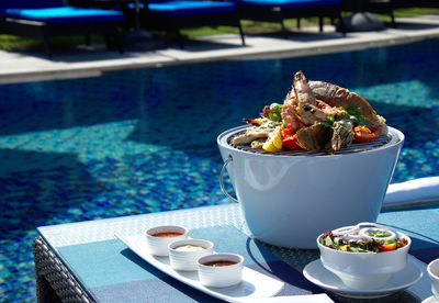 Asian food prepares on pool background
