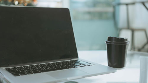 Close-up of laptop on table