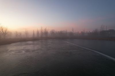 Scenic sunrise with a foggy morning