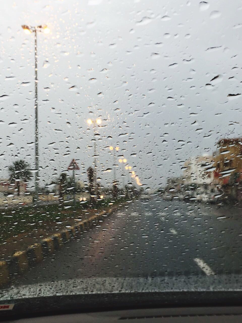 wet, glass - material, rain, window, transparent, drop, water, transportation, weather, rainy season, car, raindrop, backgrounds, mode of transport, full frame, land vehicle, vehicle interior, no people, sky, nature, day, close-up, indoors, frosted glass