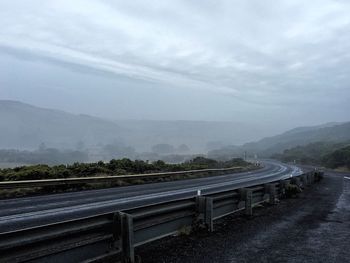 Road against sky in foggy weather