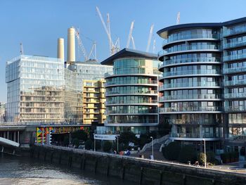 Modern buildings against sky in city