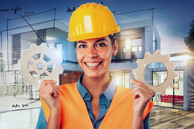 Portrait of young man working in factory
