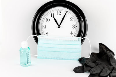 Close-up of clock against white background