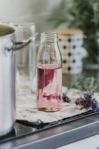 Close-up of glass jar on table