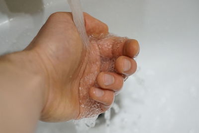 Midsection of person holding ice cream